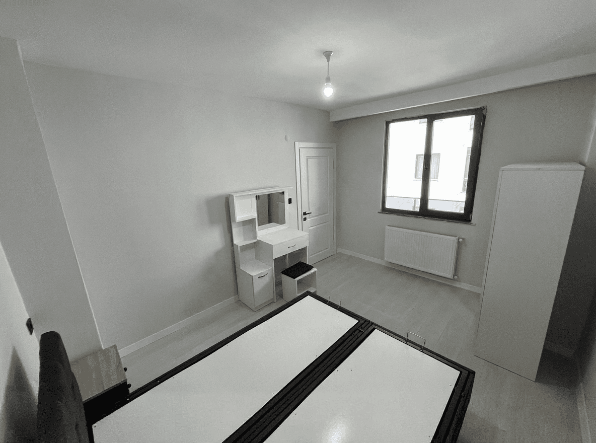 1+1 kiralık dairenin yatak odası